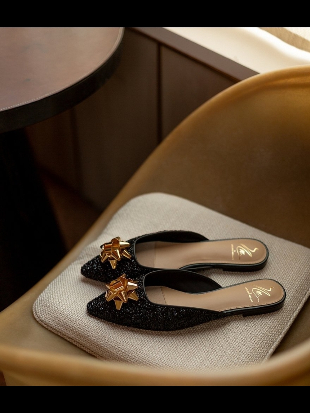 ANTONIO MELANI Black Pointed Slip-On Mule with Gold Bow